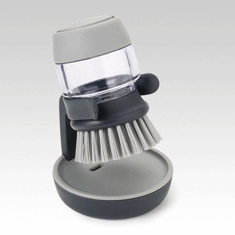 Easy grip dish brush with soap dispenser