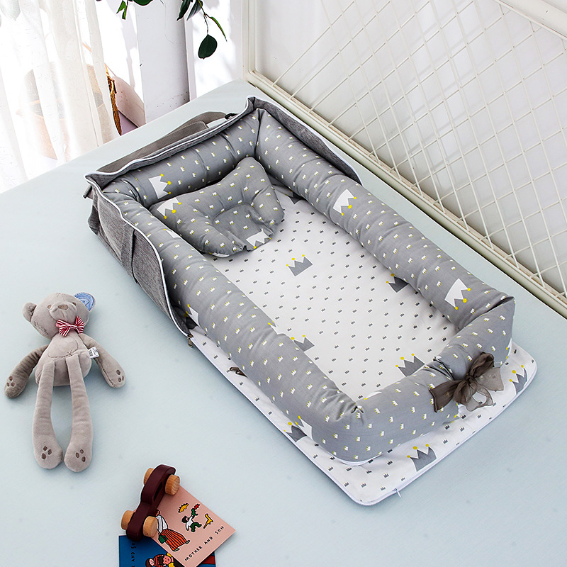 Compact Foldable Baby Crib with Pillow
