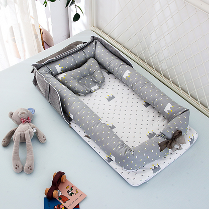 Compact Foldable Baby Crib with Pillow