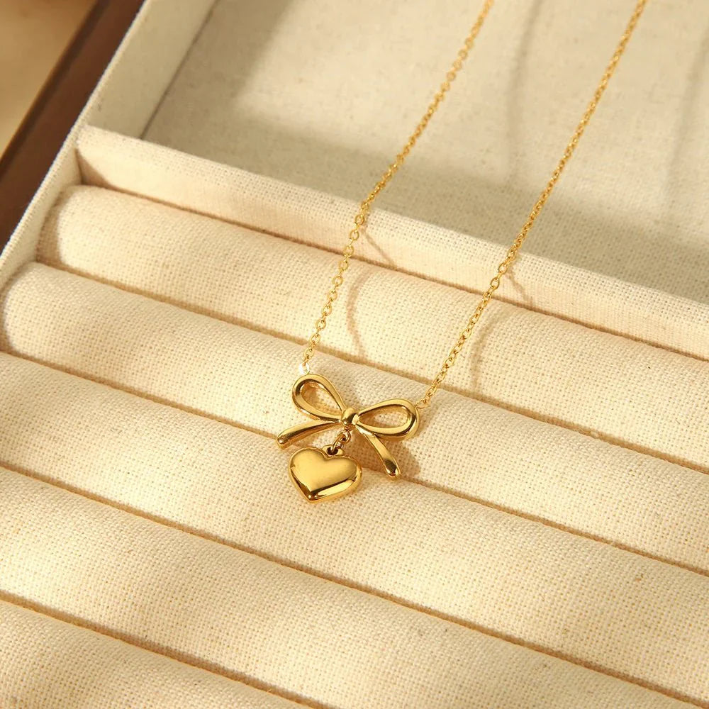 Delicate Gold Bow Heart Pendant Necklace
