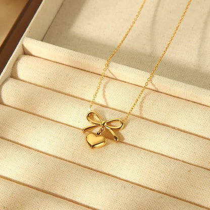 Delicate Gold Bow Heart Pendant Necklace
