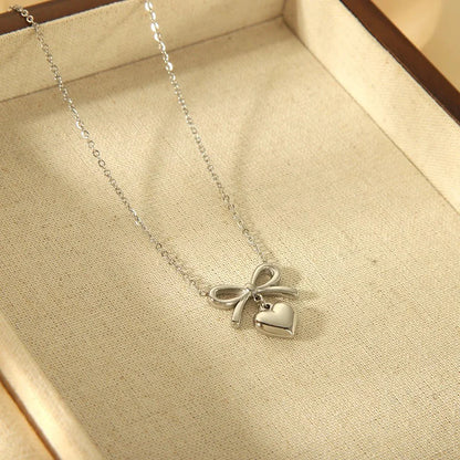 Delicate Gold Bow Heart Pendant Necklace