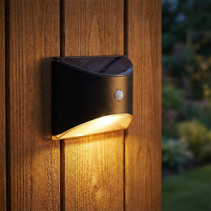 Solar fence light with motion sensor