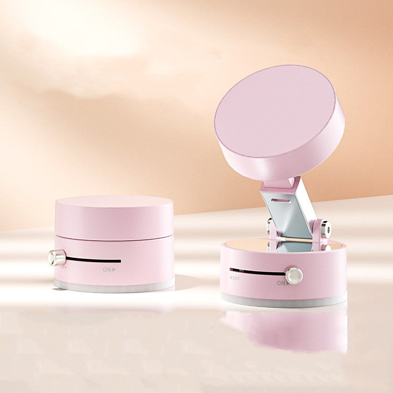 Compact Adjustable Phone Holder and Handheld Vacuum